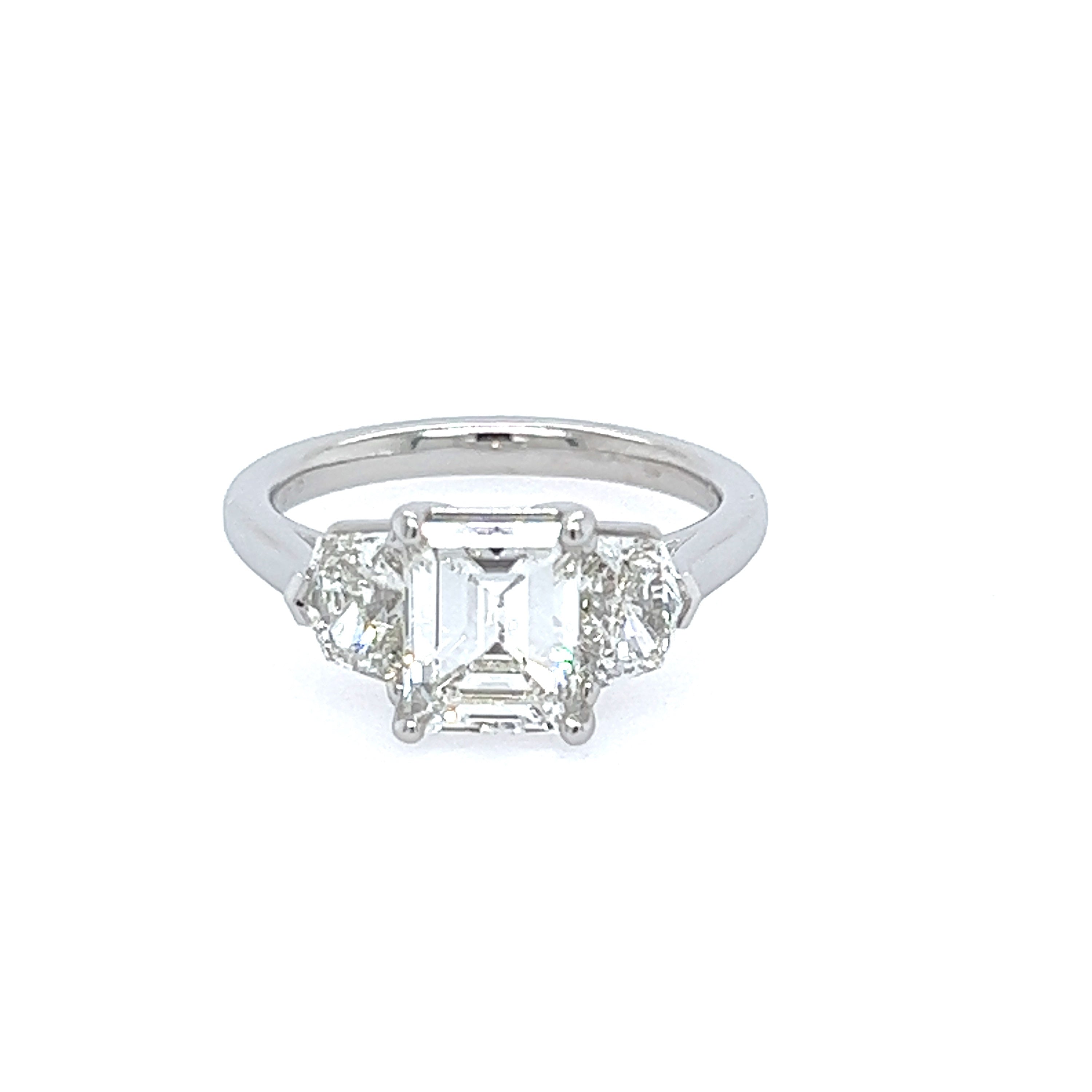 Platinum Emerald Cut Diamond Ring with Epaulette Side Stones