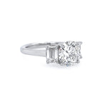 Platinum Round Diamond Ring with Emerald Cut Side Stones