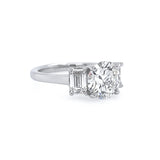 Platinum Round Diamond Ring with Emerald Cut Side Stones