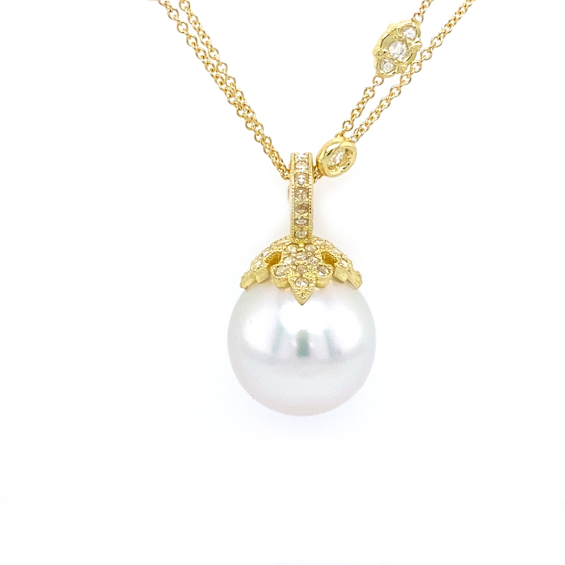 Custom designed Pearl pendant with gold chain and clasp on a white background