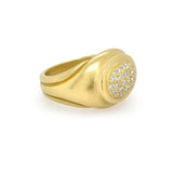 Kieselstein 18K Gold ring with diamond-studded center on a white background