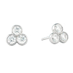 Pair of silver earrings with three diamonds on a white background