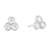 Pair of silver earrings with three diamonds on a white background