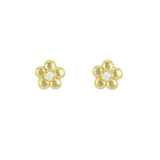 A pair of 18K yellow gold flower-shaped stud earrings with embedded diamonds in a close-up image.