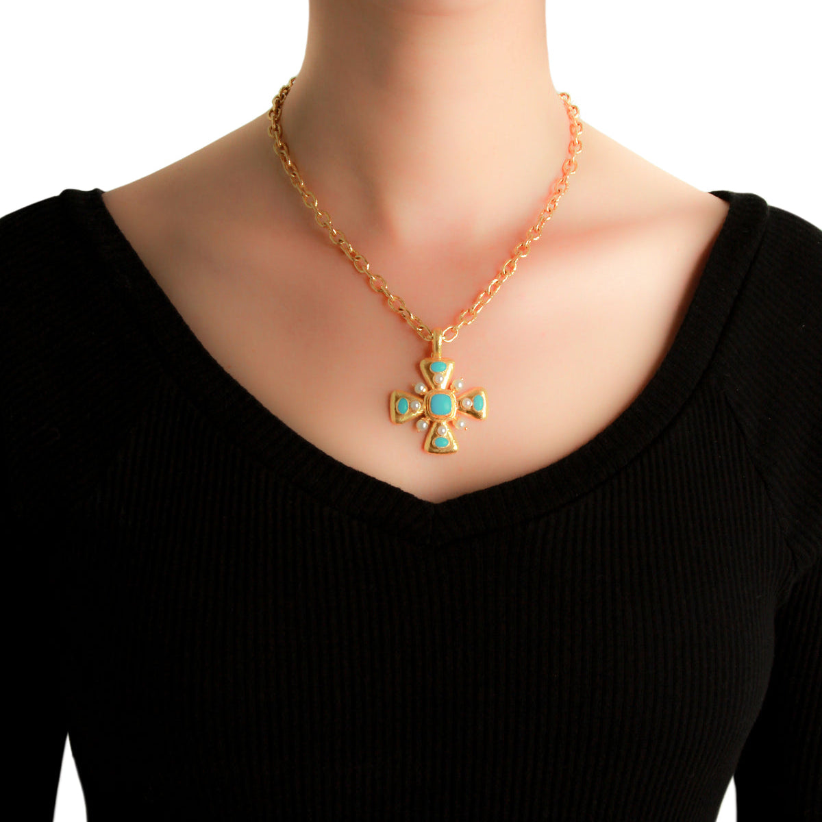 19K Gold necklace with a Maltese Cross pendant featuring turquoise stones on a black background