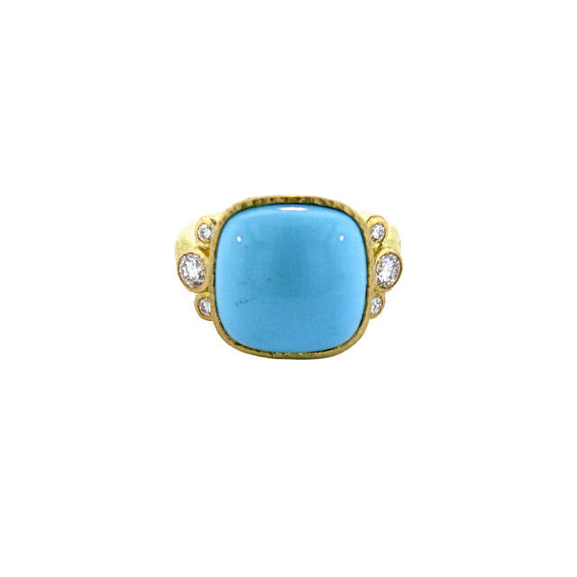 Ring with a Sleeping Beauty turquoise blue stone and gold border on a white background
