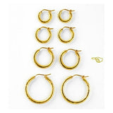 Four Sets of 19K gold hoop earrings on a white background