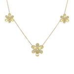 18K Gold flower-shaped necklace with diamond accents on a white background