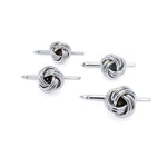 A set of sterling silver knot studs for men.
