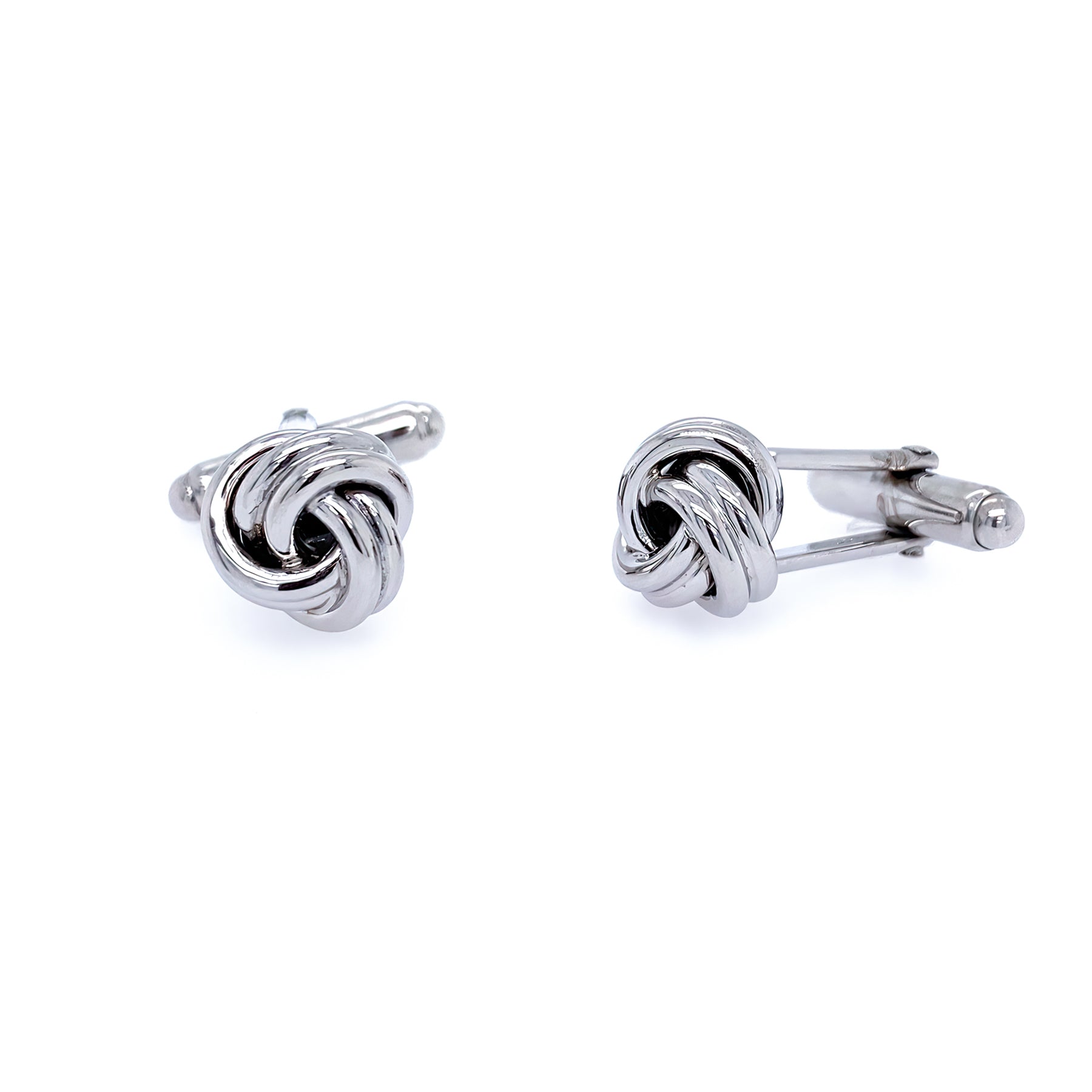 A pair of sterling silver knot cufflinks with a reflective surface.