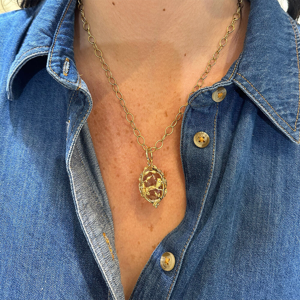 Woman wearing Temple St Clair Owl Amulet