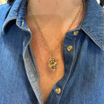 Woman wearing Temple St Clair Owl Amulet
