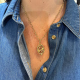 Woman wearing Temple St Clair Owl Amulet
