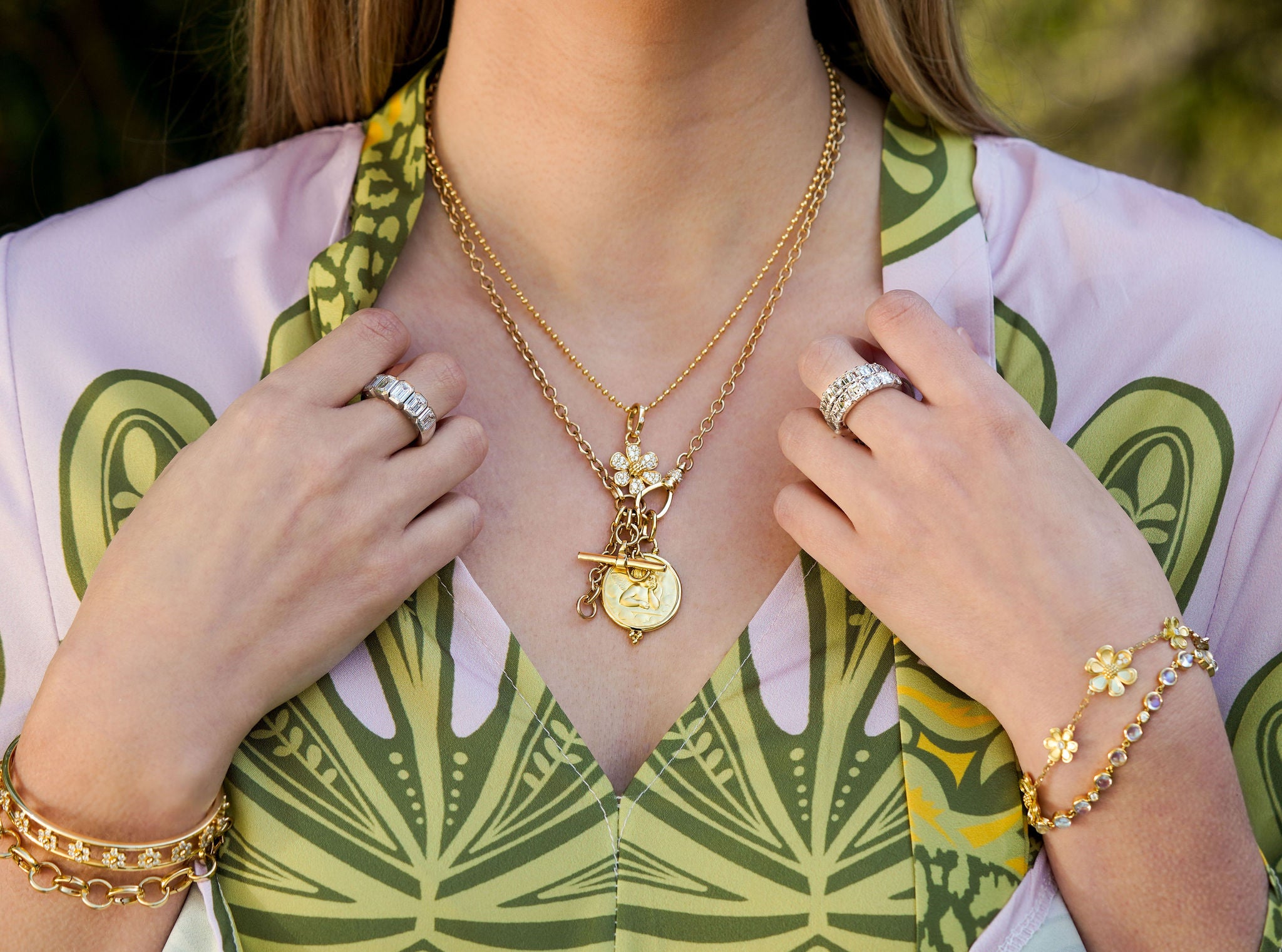 Woman wearing Temple St Clair jewelry