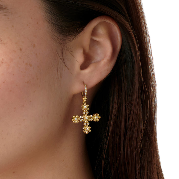Woman wearing Temple St Clair 18K gold Fiori Cross Earrings