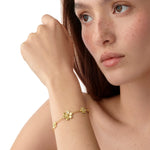 Model wearing Temple Flower Bracelet with Diamonds