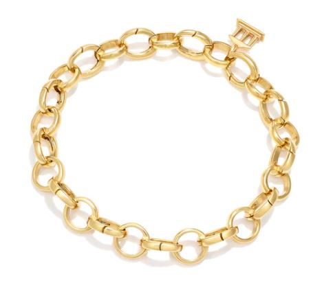 An 18K yellow gold charm bracelet with a link chain design designed by Temple St. Clair