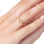 An 18K yellow gold ring with diamond links.