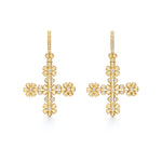 A pair of 18K yellow gold Fiori cross earrings with diamond accents.