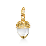 A Temple St. Clair 18K yellow gold medium-sized Arcadia amulet with a clear crystal and gold and diamond details.