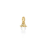 An 18k yellow gold granulated amulet with a natural rock crystal and diamond accent