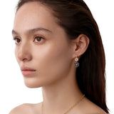Woman wearing Temple St Clair Diamond and Blue Sapphire Fiori Drop Earrings