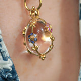 Close-up of a Temple St Clair medium Fiori Amulet with a floral design 