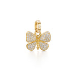 An 18K yellow gold pendant in the shape of a butterfly, adorned with diamonds.