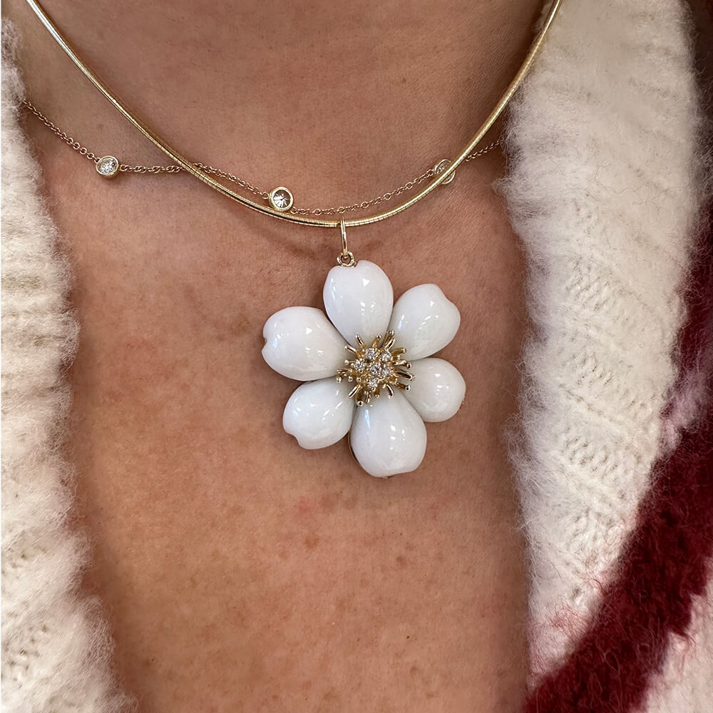 White Coral flower-shaped pendant on a 14K gold chain