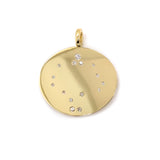 yellow gold disc with scatter diamonds
