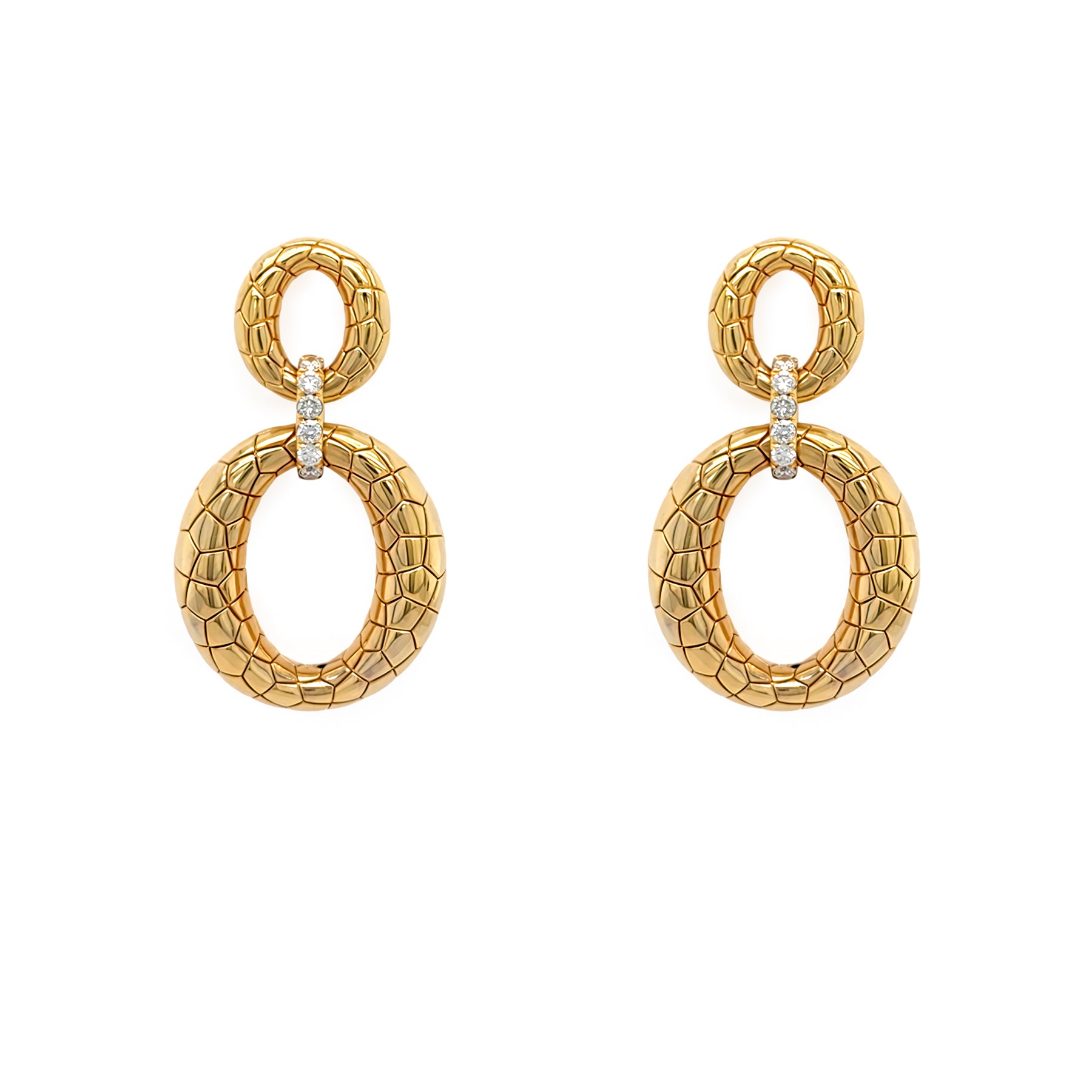Gold drop earrings with intricate design on a white background