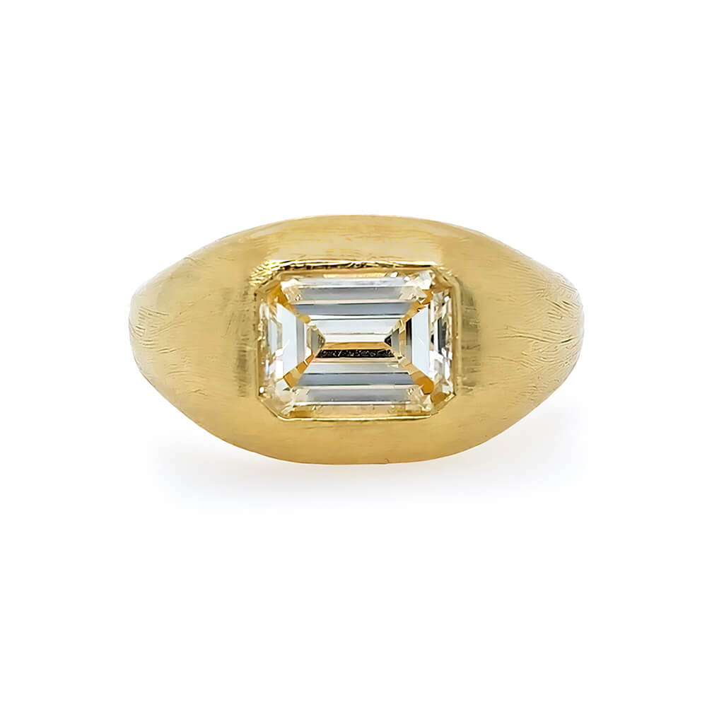 Estate yellow gold ring with emerald cut diamond