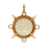 back view of 19K Gold pendant with a central coin-like design and pearl accents on a white background