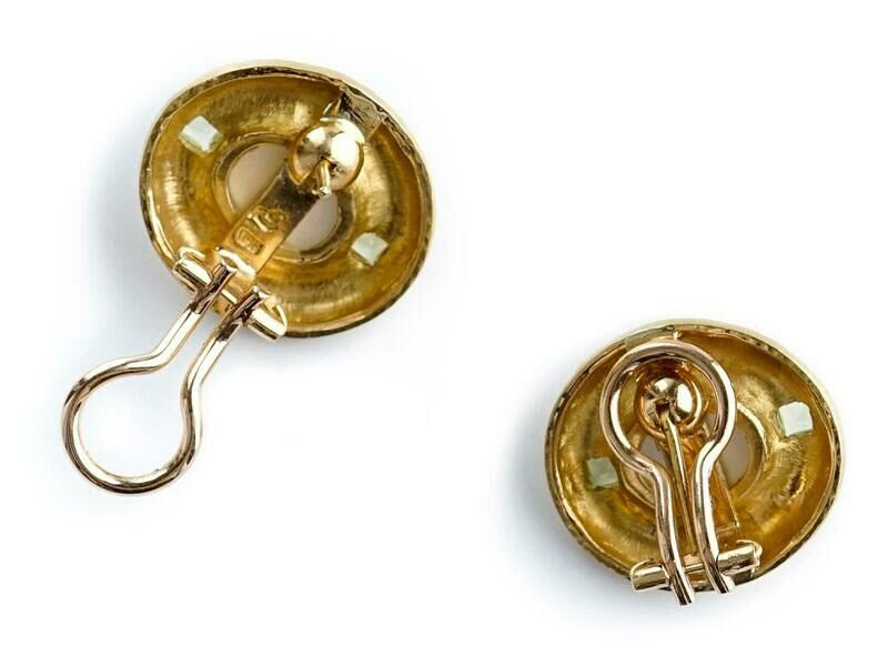 back view of pair of 19K gold earrings on a white background