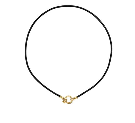 A black leather cord with a gold-colored clasp designed by Temple St Clair