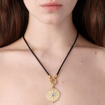 Temple St Clair black leather cord with pendant on model