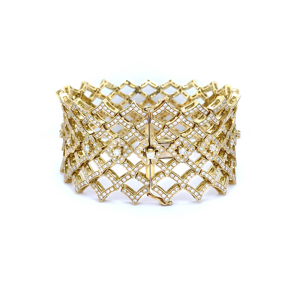 View of clasp on 18k gold and diamond bracelet