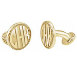 A pair of gold-colored cufflinks with intricate details and monogrammed initials.