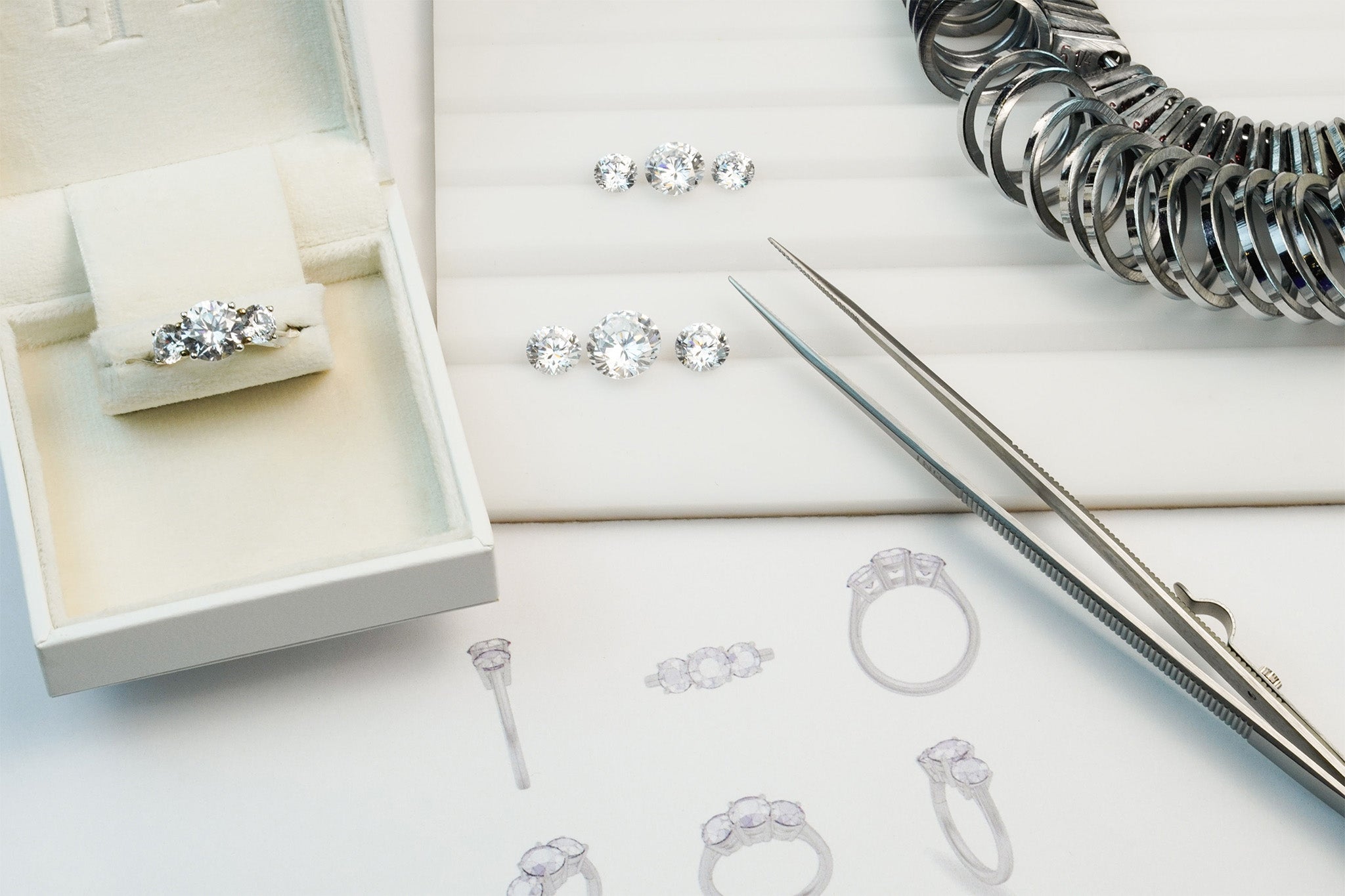 Custom diamond rings creation process including tools.