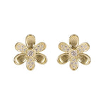A pair of 18K yellow gold flower-shaped stud earrings, each decorated with small clear pavé diamonds in the center and along the petal edges, set against a plain white background.