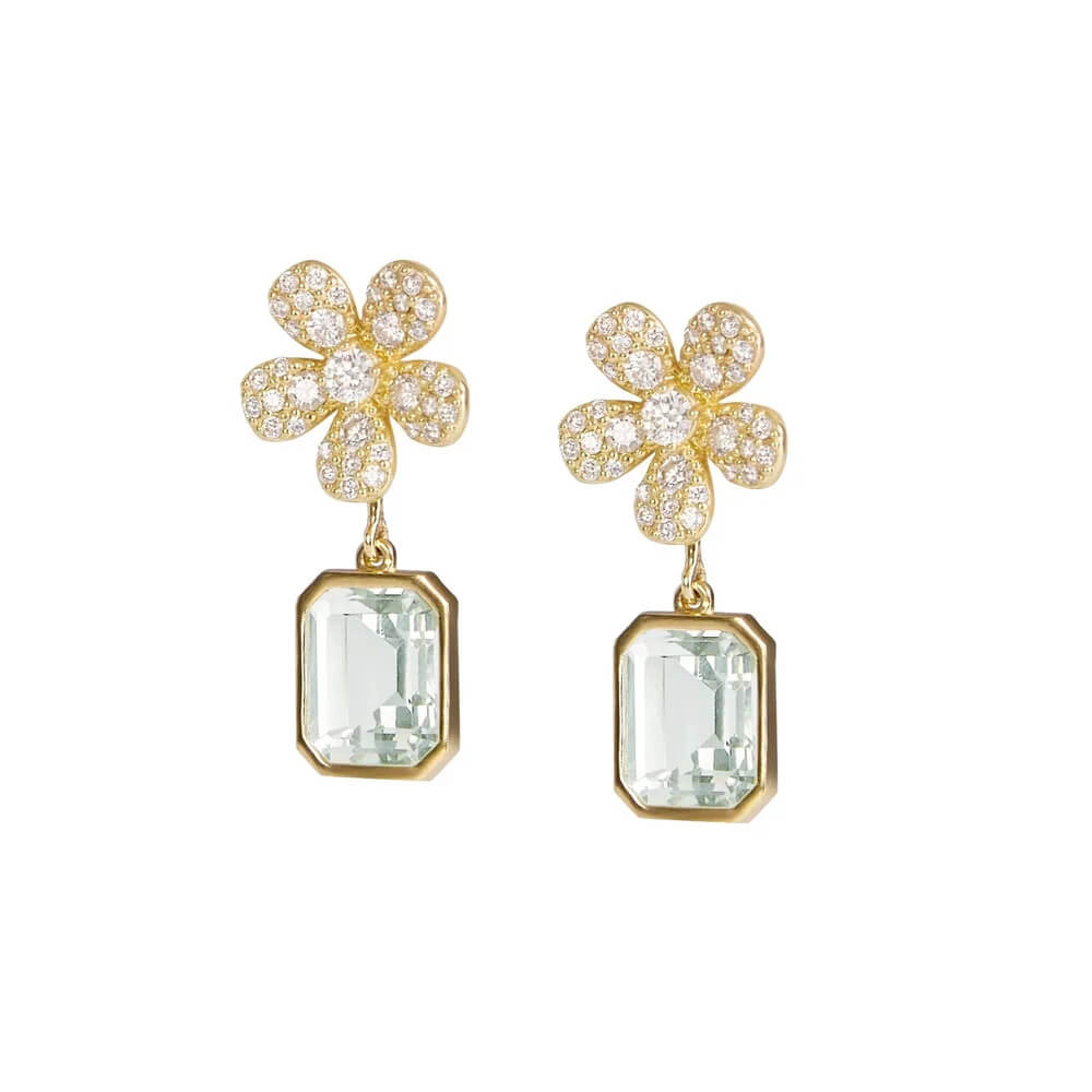 A pair of 18K yellow gold flower drop earrings, each featuring a flower head paved with small clear diamonds and a rectangular green amethyst gemstone dangling below, shown on a plain white background.