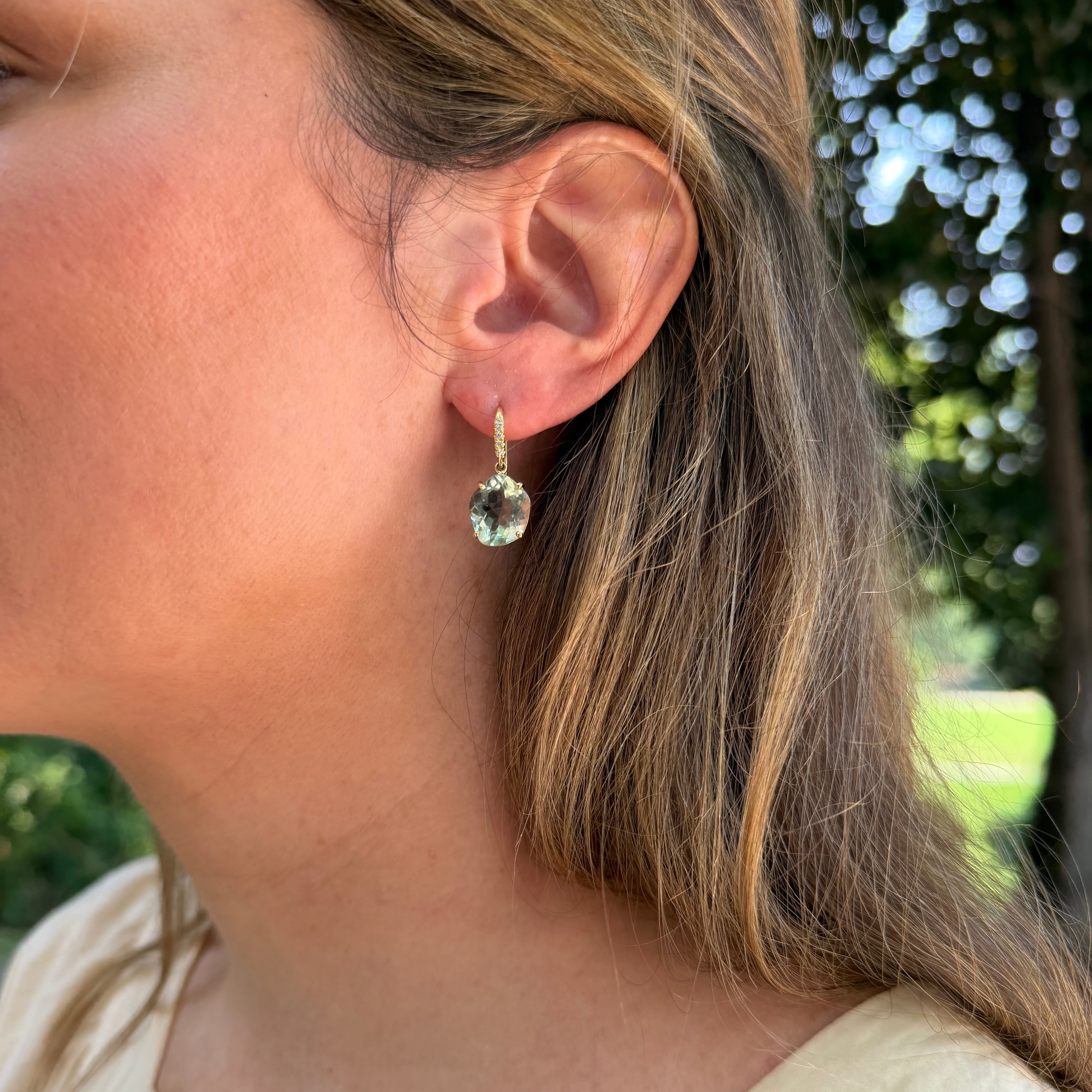green_amethyst_earrings_on_ear