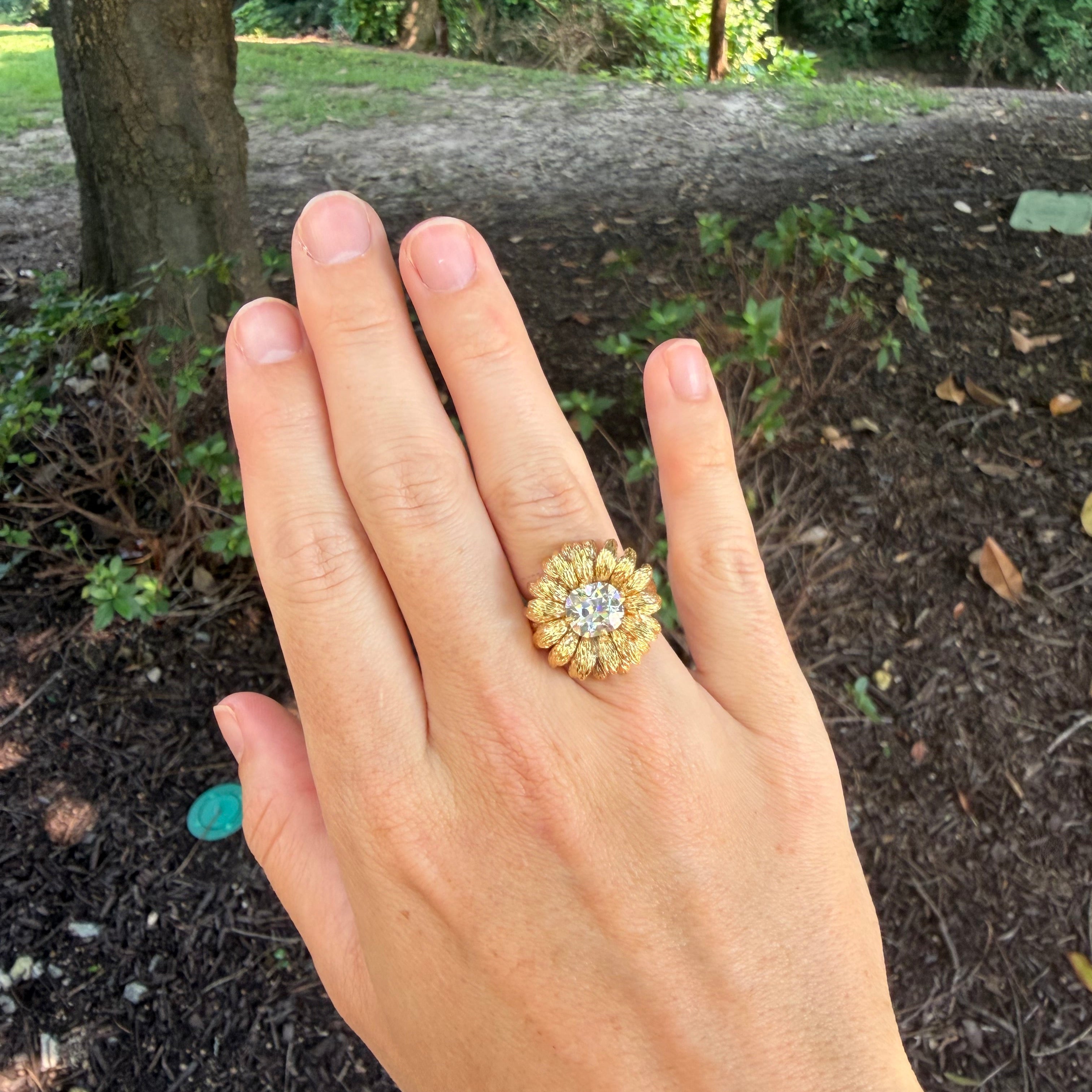 old_mine_cushion_ring_on_hand