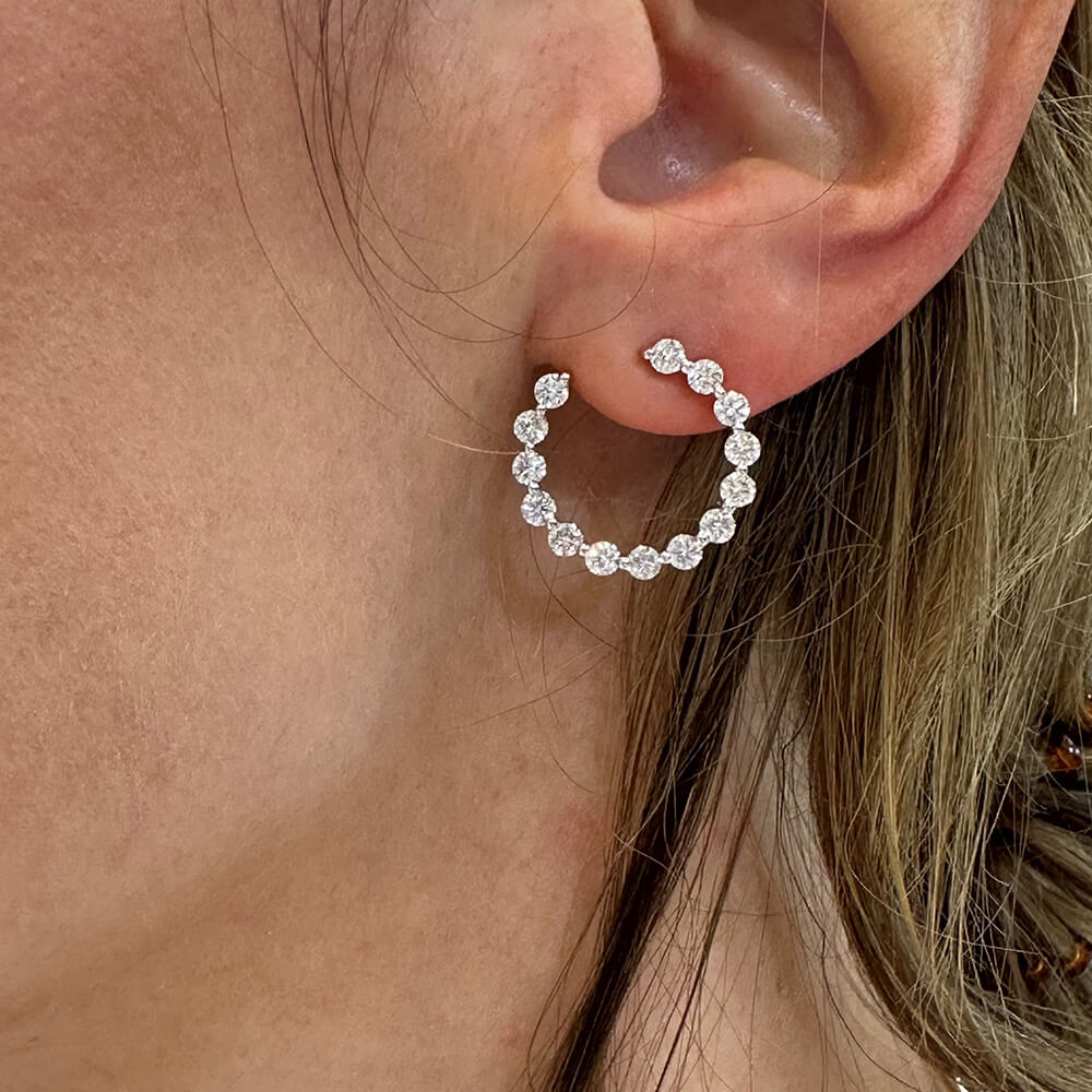Close-up of a diamond hoop earring
