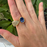 pear_diamond_and_sapphire_ring on hand