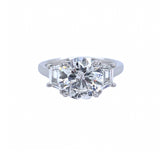 Platinum Round Diamond Ring with Trapezoid Side Stones