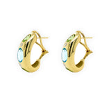 side view of 14K gold earring with blue topaz, peridot and diamonds