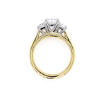 18K yellow Gold diamond engagement ring with trapezoids on a white background