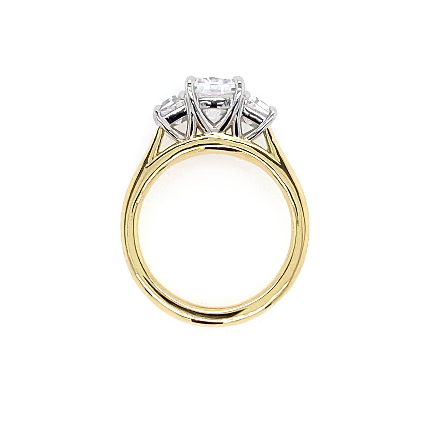 18K yellow Gold diamond engagement ring with trapezoids on a white background