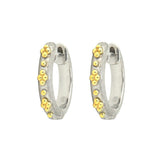 A pair of 18K yellow gold and sterling silver beaded huggie earrings by Jude Frances